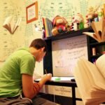 Students preparing for government exams 2025 with books and study materials